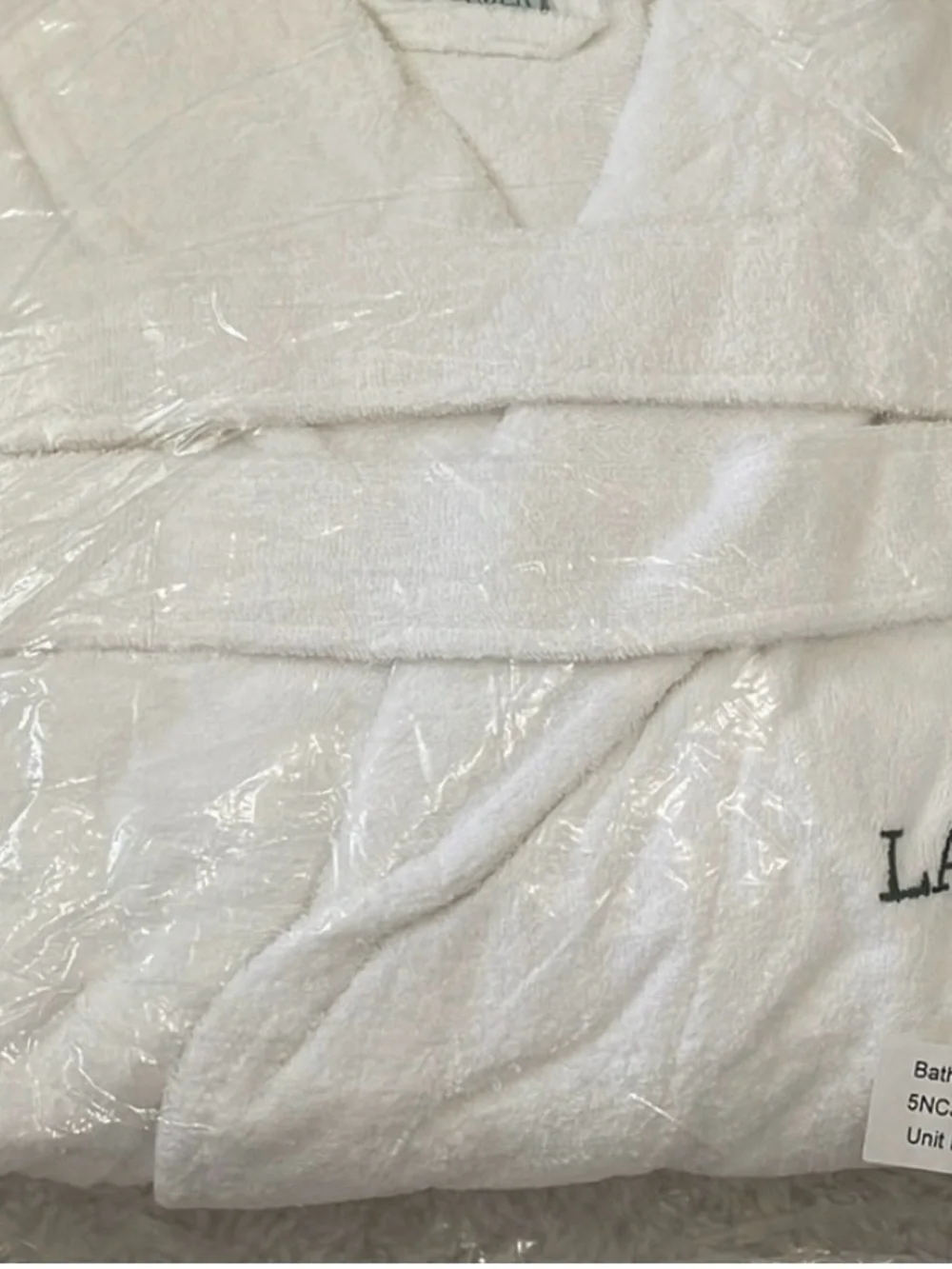 La Mer White Luxury Plush Robe with Embroidered Logo.
